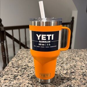 YETI Stainless Steel Mug with Bright Orange Lid